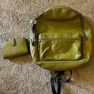 Mini coach court backpack and wallet.